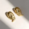 gold face earrings